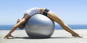 Woman working out with an exercise ball